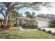 Charming single-story home with lush front yard and attached two-car garage at 500 Pickfair Ter, Lake Mary, FL 32746