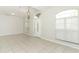 Bright foyer with tiled flooring, chandelier, and natural light at 500 Pickfair Ter, Lake Mary, FL 32746