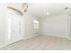 Bright foyer with tiled flooring, chandelier, and natural light at 500 Pickfair Ter, Lake Mary, FL 32746