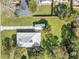 Bird's eye view of property, highlighting spacious yard and detached garage at 513 Wisconsin Ave, St Cloud, FL 34769