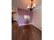 Dining area with wood flooring, chandelier, and a view into the kitchen at 6250 S Bend Sq # 17, Orlando, FL 32807