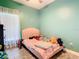 Cozy bedroom with a window and ample space for furniture and decor at 7214 Rex Hill Trl, Orlando, FL 32818