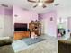 Cozy living room with a ceiling fan and tile flooring at 7214 Rex Hill Trl, Orlando, FL 32818