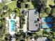 Aerial view of the resort amenities including pool, tennis and pickleball courts at 7465 Gathering Loop, Reunion, FL 34747