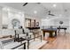 Upstairs game room featuring a pool table, foosball, wet bar, and plenty of room for entertainment at 7465 Gathering Loop, Reunion, FL 34747