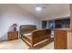 Bedroom featuring carpeted floors, window and dark shades, and furnishings at 762 Lake Como Dr, Lake Mary, FL 32746