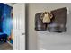 Neutral towels and decorative hand towels in a bathroom, next to a doorway at 7671 Otterspool St, Kissimmee, FL 34747