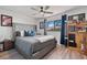 Bedroom with gray accents, a window, and shelving at 7709 Sundial Ln, Orlando, FL 32819