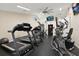 Community gym featuring modern exercise equipment including treadmills, ellipticals, and a weight machine at 7709 Sundial Ln, Orlando, FL 32819