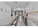 Spacious kitchen featuring granite countertops, stainless steel appliances, and a wine fridge at 7709 Sundial Ln, Orlando, FL 32819