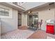 Outdoor patio with table, chairs, grill, brick pavers, and ceiling fan at 7709 Sundial Ln, Orlando, FL 32819