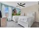 Cheerful bedroom showcasing playful decor and dual beds, creating a delightful space for children at 7916 Golden Pond Cir, Kissimmee, FL 34747