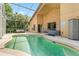 Beautiful pool and patio area with hot tub, great for relaxing and enjoying the serene outdoors with mature trees at 7916 Golden Pond Cir, Kissimmee, FL 34747