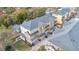 Aerial shot of the neighborhood featuring the buildings, walkways, landscaping, and roof tops at 11 W Harding St # D, Orlando, FL 32806