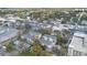 Aerial view of neighborhood homes with lush trees, commercial businesses, and buildings at 11 W Harding St # D, Orlando, FL 32806