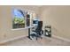 Office space featuring a modern desk with large window for natural light at 11 W Harding St # D, Orlando, FL 32806