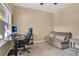 Office space featuring a modern desk and comfortable sofa at 11 W Harding St # D, Orlando, FL 32806