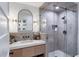 Stylish bathroom features a glass shower, modern vanity and neutral design at 1100 S Lake Sybelia Dr, Maitland, FL 32751