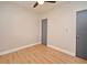 Bright bedroom with wood-look floors and a ceiling fan at 117 Shannon Dr, Sanford, FL 32773