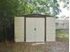 Backyard view of the storage shed, which offers practical outdoor storage for tools and equipment at 117 Shannon Dr, Sanford, FL 32773