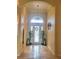 Welcoming foyer with soaring ceilings, tiled floors, and decorative accents at 12625 Sweet Hill Rd, Polk City, FL 33868