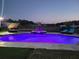 Evening view of the pool and backyard at 12625 Sweet Hill Rd, Polk City, FL 33868