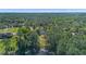 Aerial view showcasing the property's lush surroundings and sprawling landscape at 1303 Sultan Cir, Chuluota, FL 32766