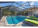 Relaxing screened-in pool and patio area with ample lounge space, perfect for outdoor entertaining at 1303 Sultan Cir, Chuluota, FL 32766