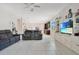 Bright and airy living room with plenty of space for Gathering and friends to gather and relax at 132 Lake Smart Cir, Winter Haven, FL 33881