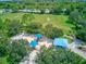 Aerial view of a playground with mature trees, promising fun and adventure for in a natural setting at 13209 Wild Duck Ct, Orlando, FL 32828