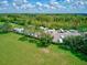 Aerial view of RV parking area, with green lawns and mature trees creating a welcoming outdoor lifestyle at 13209 Wild Duck Ct, Orlando, FL 32828