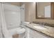 Traditional bathroom featuring a granite countertop and a shower-tub combination at 13330 Meergate Cir, Orlando, FL 32837