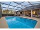 Large screened-in pool with ample space for entertaining and lounging at 13330 Meergate Cir, Orlando, FL 32837