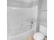 Bathroom with a tub/shower combo and a new white toilet at 13941 Fairway Island Dr # 733, Orlando, FL 32837