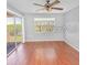 A bright bedroom with sliding door access to a private deck at 13941 Fairway Island Dr # 733, Orlando, FL 32837