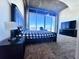 Main bedroom with carpet, lots of sunlight, and a tall view at 155 S Court Ave # 2904-Penthouse, Orlando, FL 32801