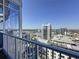 Beautiful balcony view of the city with a rail in the foreground at 155 S Court Ave # 2904-Penthouse, Orlando, FL 32801