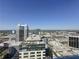 Amazing high-rise view of the cityscape with blue sky from high up on a balcony at 155 S Court Ave # 2904-Penthouse, Orlando, FL 32801