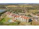 Aerial shot featuring the community building, pool, and parking lot at 16300 County Road 455 # 712, Montverde, FL 34756