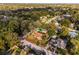 Charming single-Gathering home nestled amongst mature trees in a quiet residential neighborhood, aerial view at 1801 Chamberlin St, Orlando, FL 32806