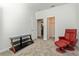 Small bedroom featuring neutral carpet, and minimalist design at 1908 Perch Hammock Loop, Groveland, FL 34736