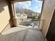 View from the balcony overlooking the parking area and surrounding buildings at 2013 Tizewell Cir # 1408, Orlando, FL 32837