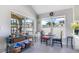 Bright breakfast nook filled with natural light from the many windows at 2806 Baywood Ln, Kissimmee, FL 34746