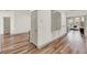 A hallway with durable floors and neutral tones complements the modern design, leading into naturally lit rooms at 3245 Upland Pt, Oviedo, FL 32765