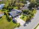 Aerial view of a blue house, showing the surrounding landscaping and neighborhood at 328 Lake Fair Ln, Winter Park, FL 32789