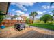 Backyard deck with outdoor seating, perfect for entertaining and enjoying the outdoors at 328 Lake Fair Ln, Winter Park, FL 32789