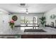 Kitchen view showcasing granite countertops, stainless steel faucet, and an adjacent dining area at 328 Lake Fair Ln, Winter Park, FL 32789