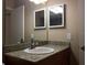 Granite countertop vanity with updated faucet in bright bathroom at 335 Wymore Rd # 201, Altamonte Springs, FL 32714