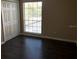 Bedroom with a closet and large window offering natural light and exterior views at 335 Wymore Rd # 201, Altamonte Springs, FL 32714