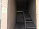 Exterior staircase leading to upper level unit featuring painted wall finish at 335 Wymore Rd # 201, Altamonte Springs, FL 32714